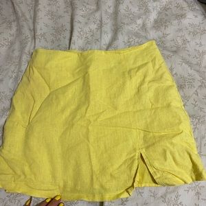 yellow mini skirt with small slit